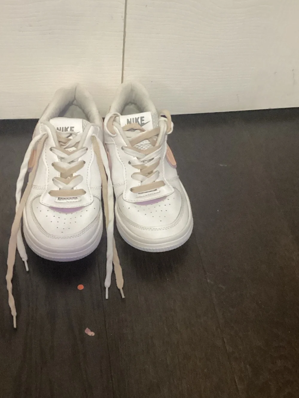Nike Kids White Sneakers with Pastel Purple and Peach Accents